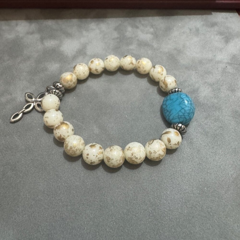 Turquoise Stone Cream and Gold Beaded Stretch Bracelet With Cross Charm